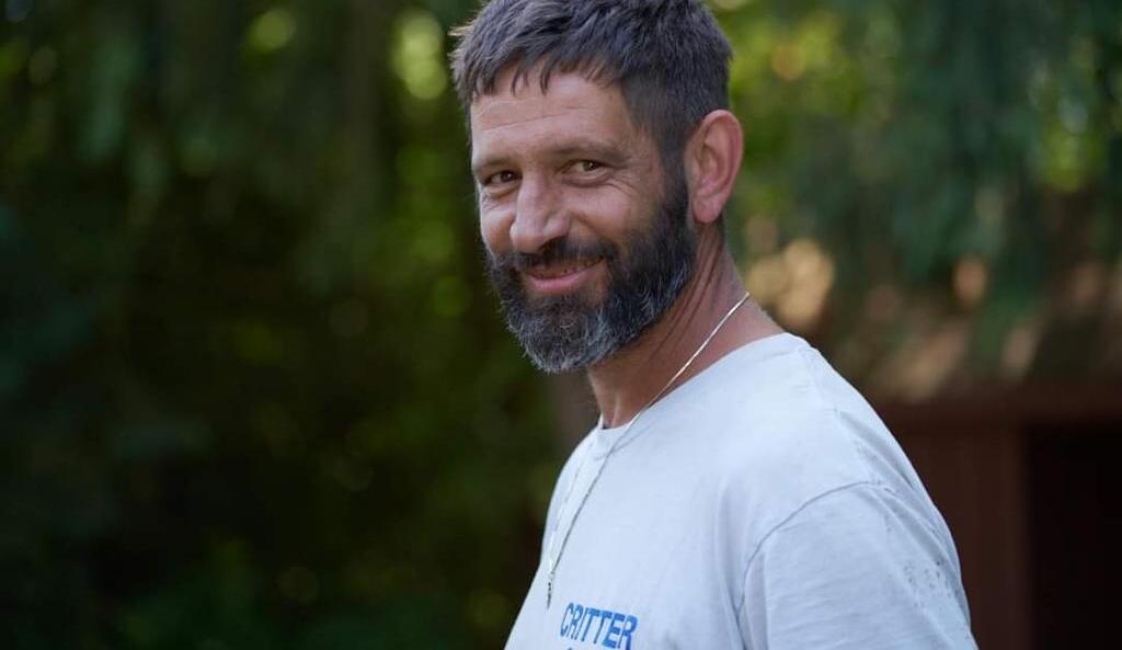 Dave from The Critter Guy on a residential job site